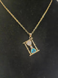 The Golden Hourglass Necklace